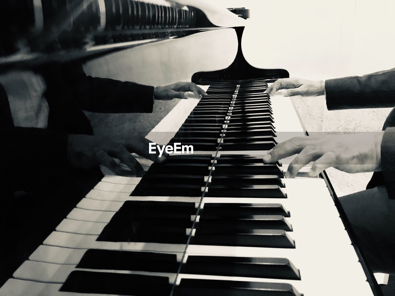 LOW ANGLE VIEW OF PIANO KEYS