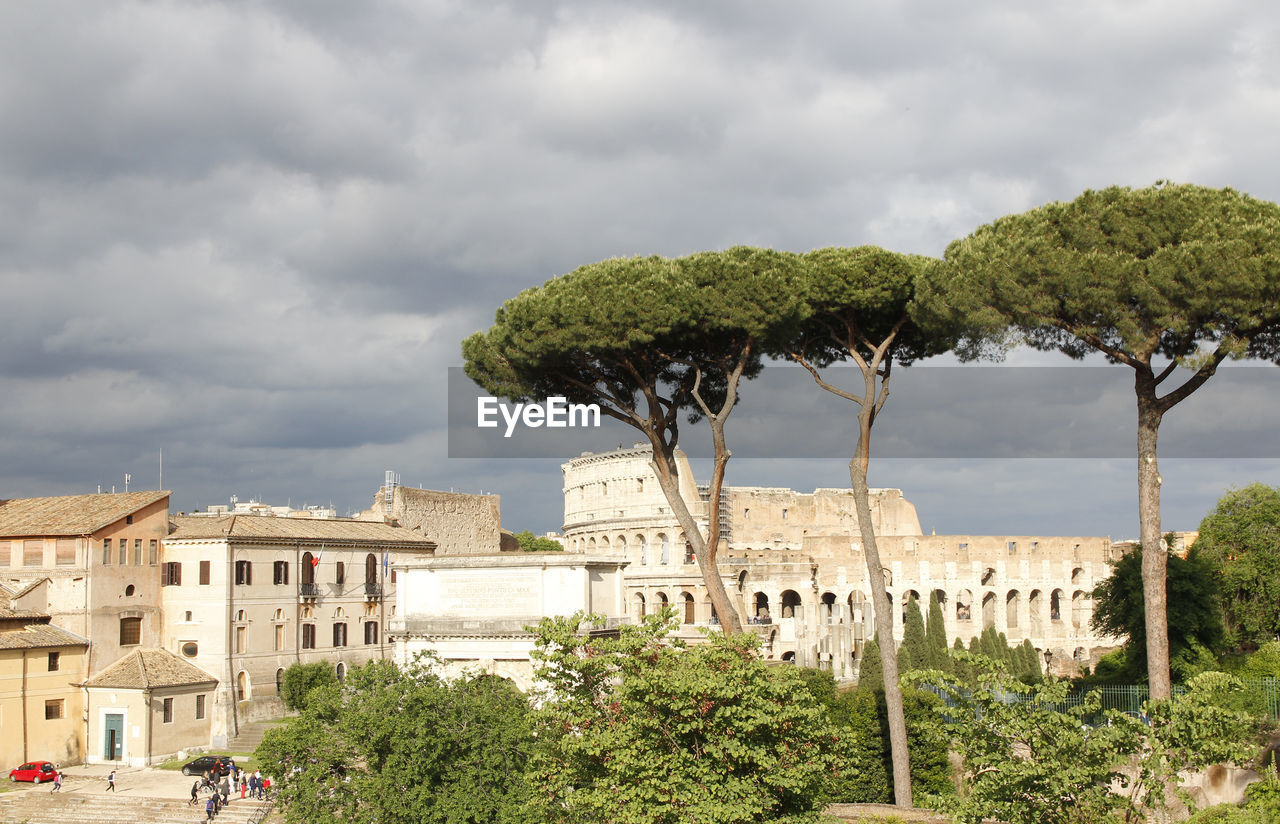 View of the roman forum and colosseum during sunset in rome, italy