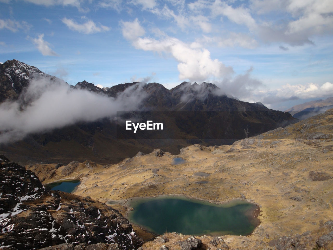 SCENIC VIEW OF VOLCANIC MOUNTAINS AGAINST SKY