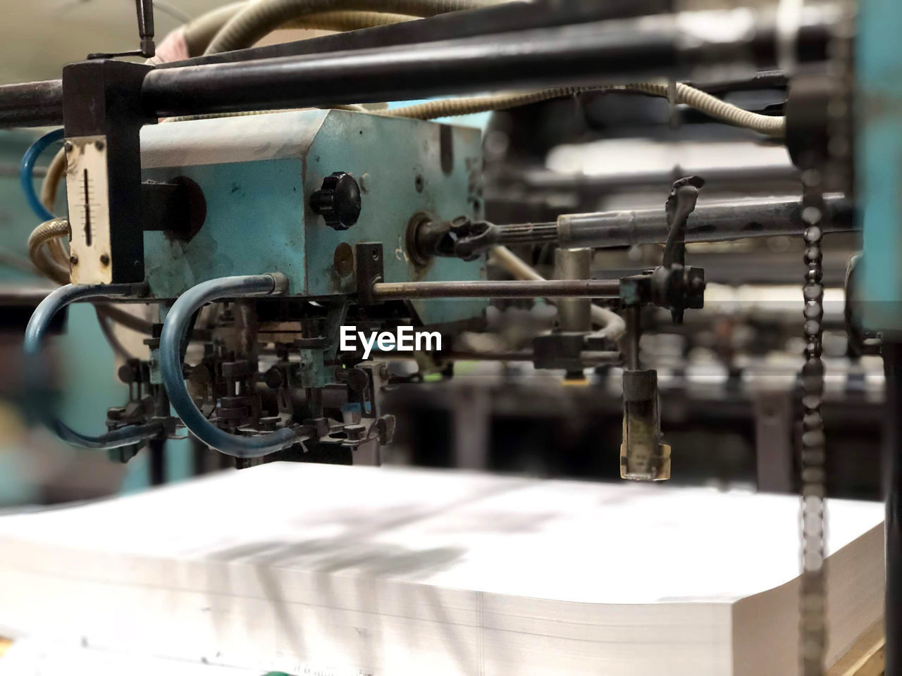 Close-up of machinery in printing press