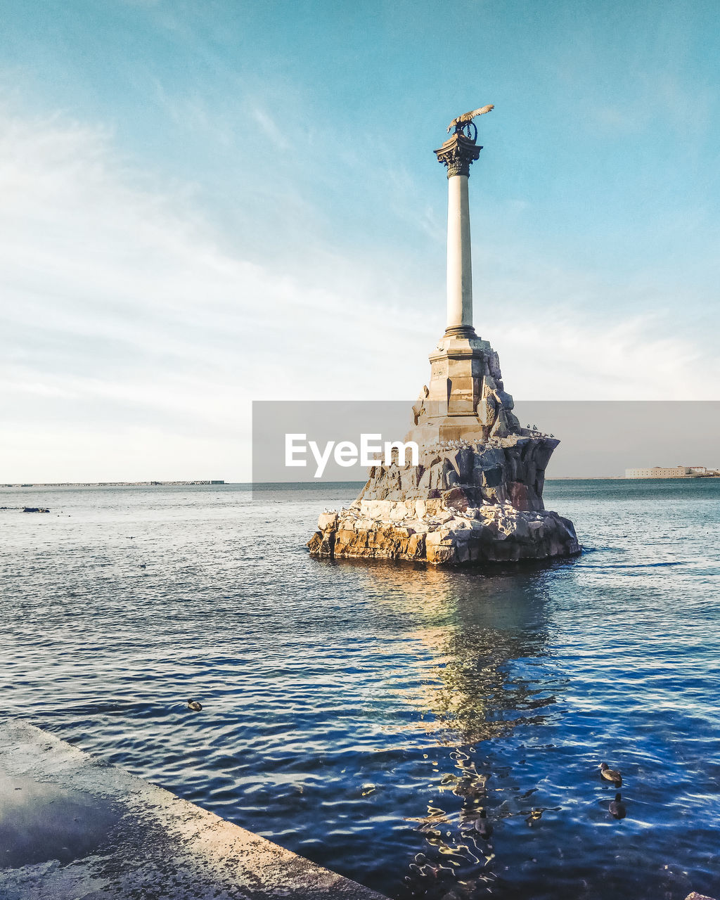 STATUE ON BEACH