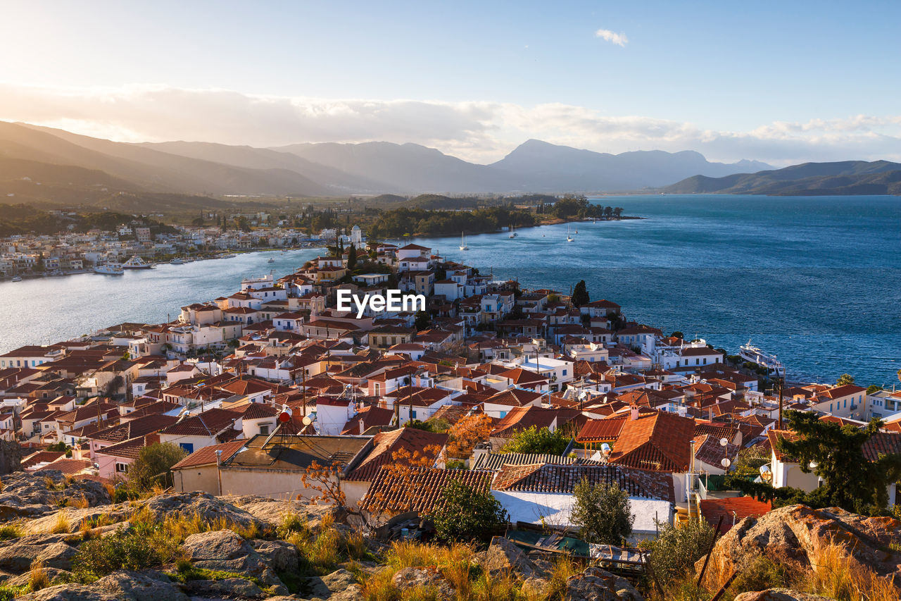 View of the chora village of poros island and galatas village.