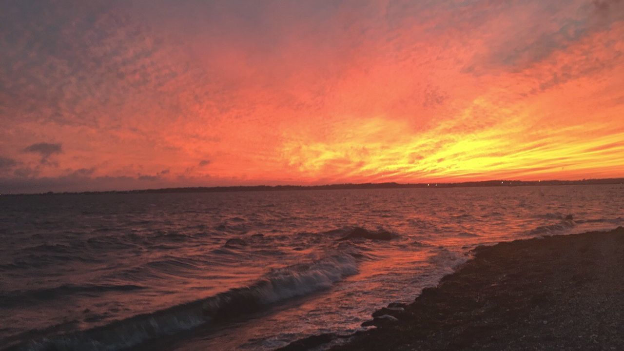 Scenic view of sunset over sea