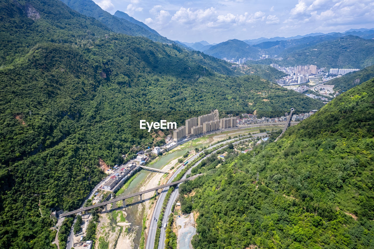 High angle view of road amidst mountains