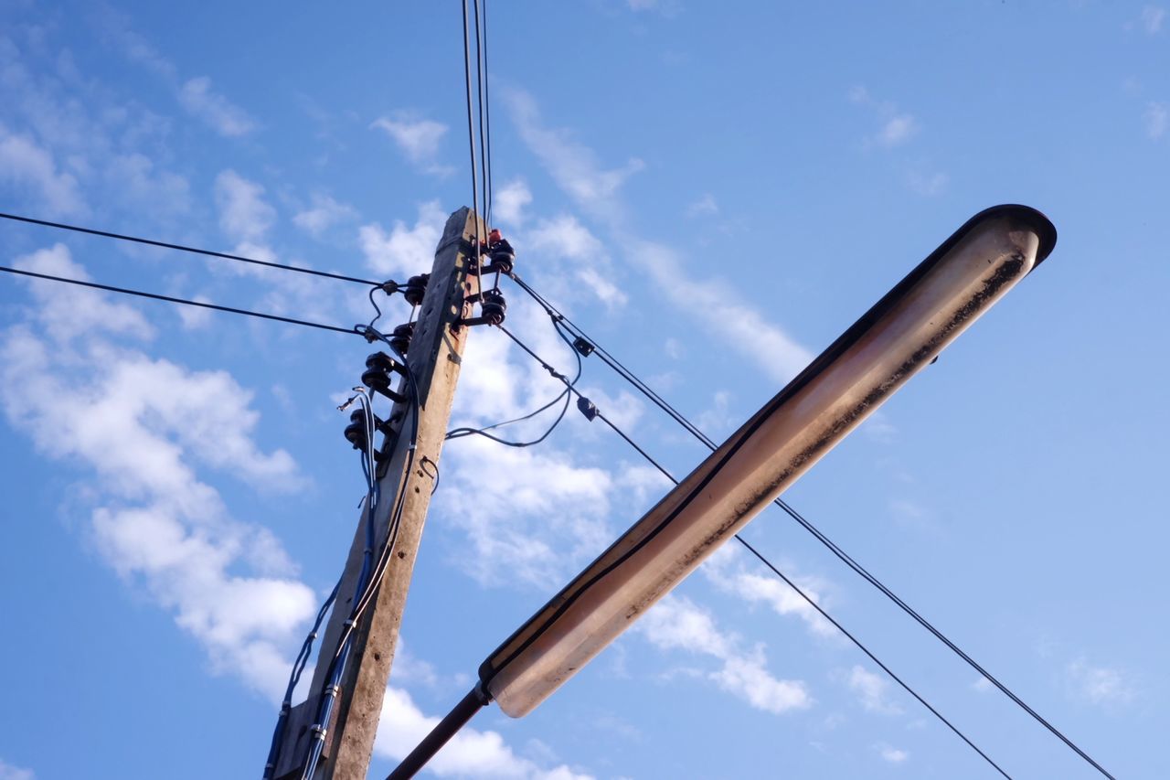 LOW ANGLE VIEW OF POWER LINES AGAINST SKY