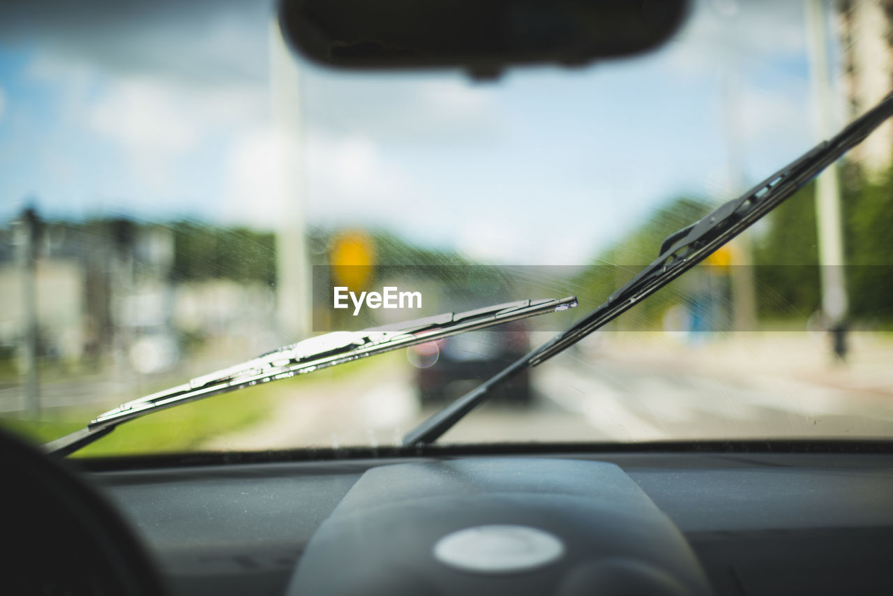 Wipers on car windshield