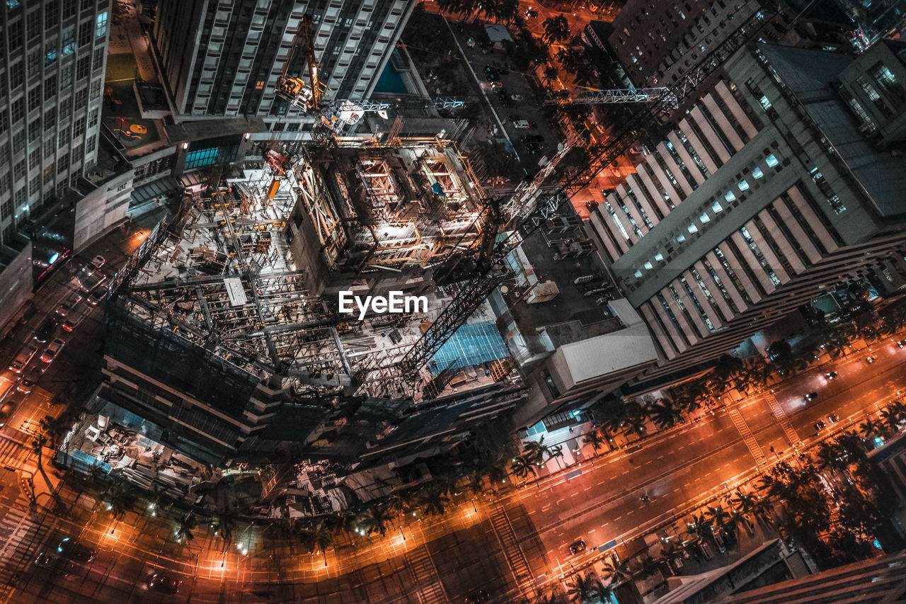 High angle view of construction site in city at night