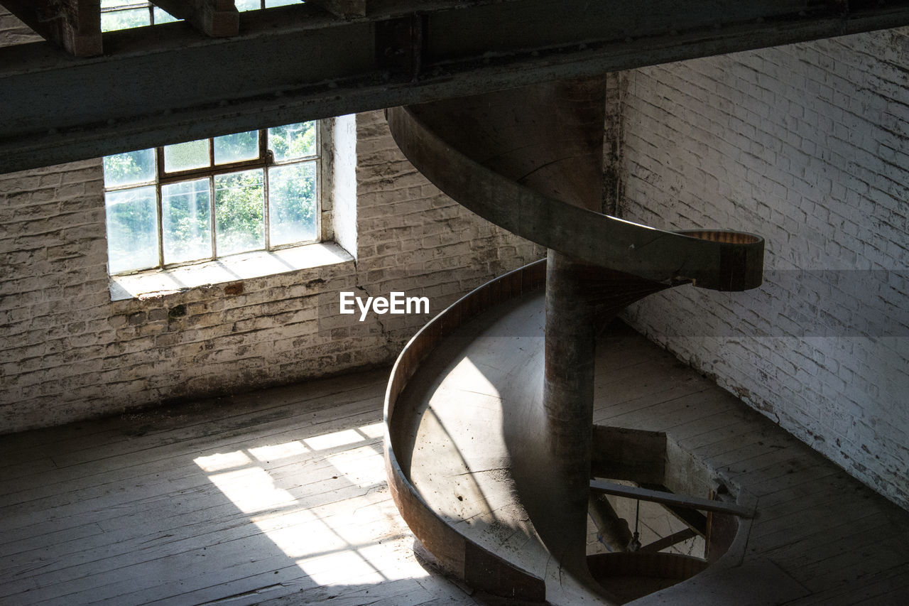 Spiral staircase in abandoned building