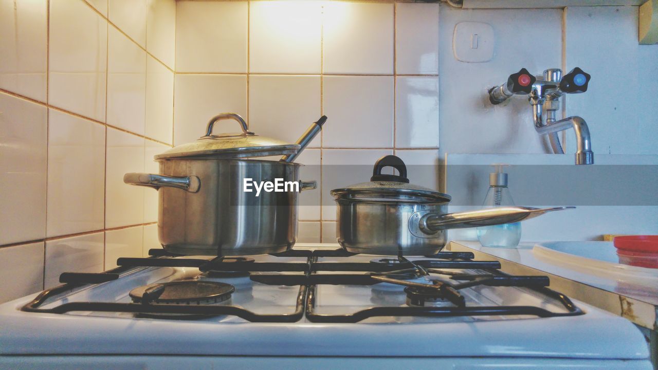 Kitchen utensil on stove at home