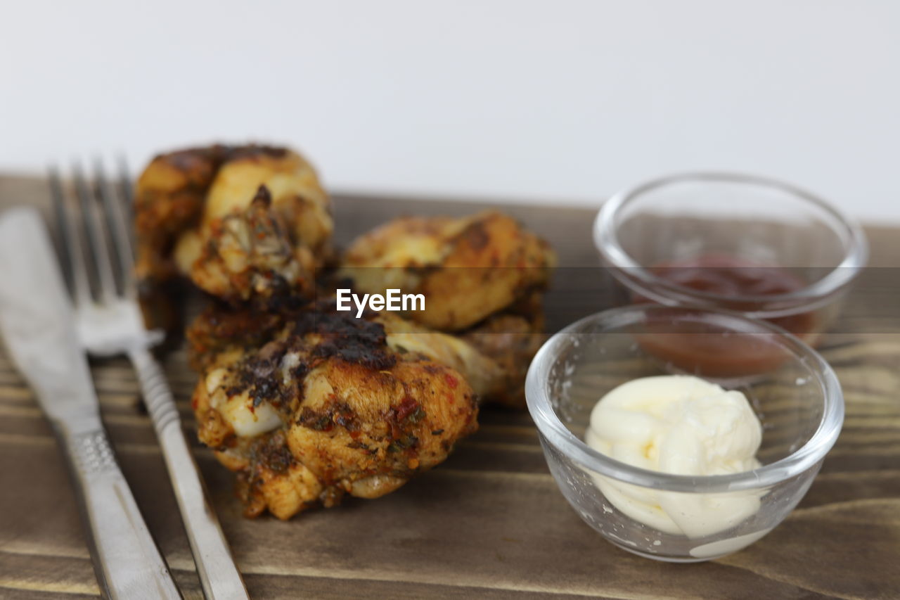 food and drink, food, dish, dessert, breakfast, freshness, produce, meal, healthy eating, baked, indoors, no people, wellbeing, studio shot, eating utensil, fried food, kitchen utensil, close-up, wood, household equipment, focus on foreground, meat, cuisine, vegetable