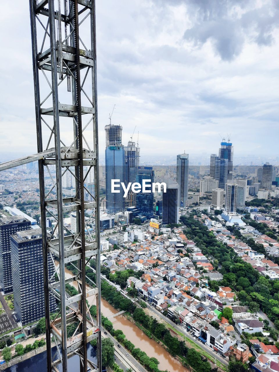 HIGH ANGLE VIEW OF MODERN BUILDINGS AGAINST SKY