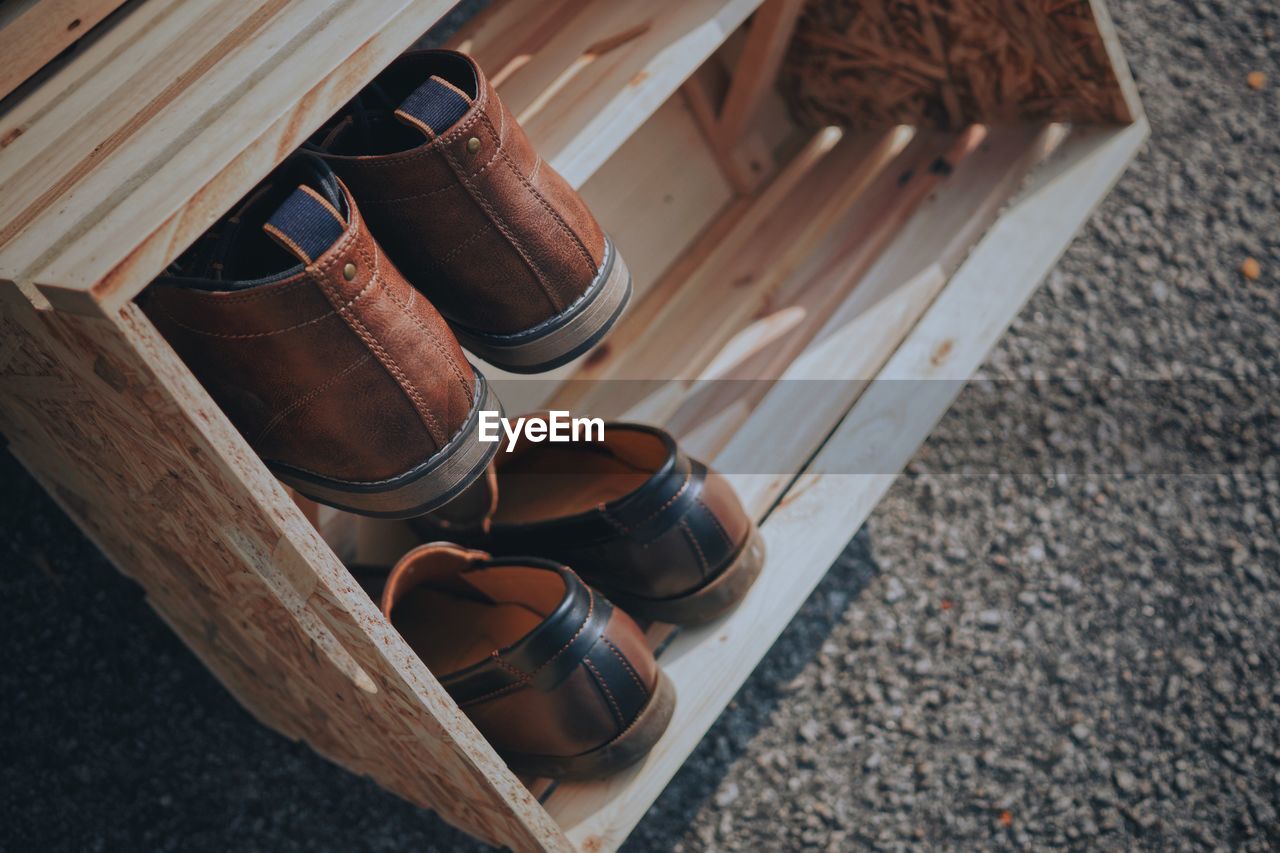 Close-up of shoes in wooden rack