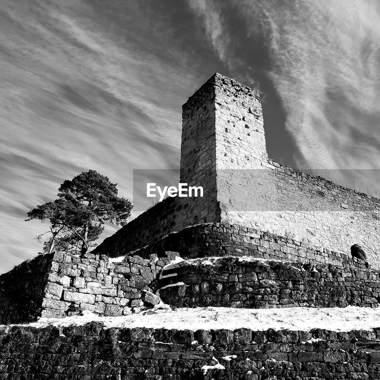 architecture, black and white, history, built structure, the past, sky, monochrome, monochrome photography, building exterior, cloud, nature, no people, old ruin, building, low angle view, old, fort, castle, wall, travel destinations, outdoors, ruins, black, ancient, day, travel, tower, white, ruined, water, land, abandoned, stone material, medieval
