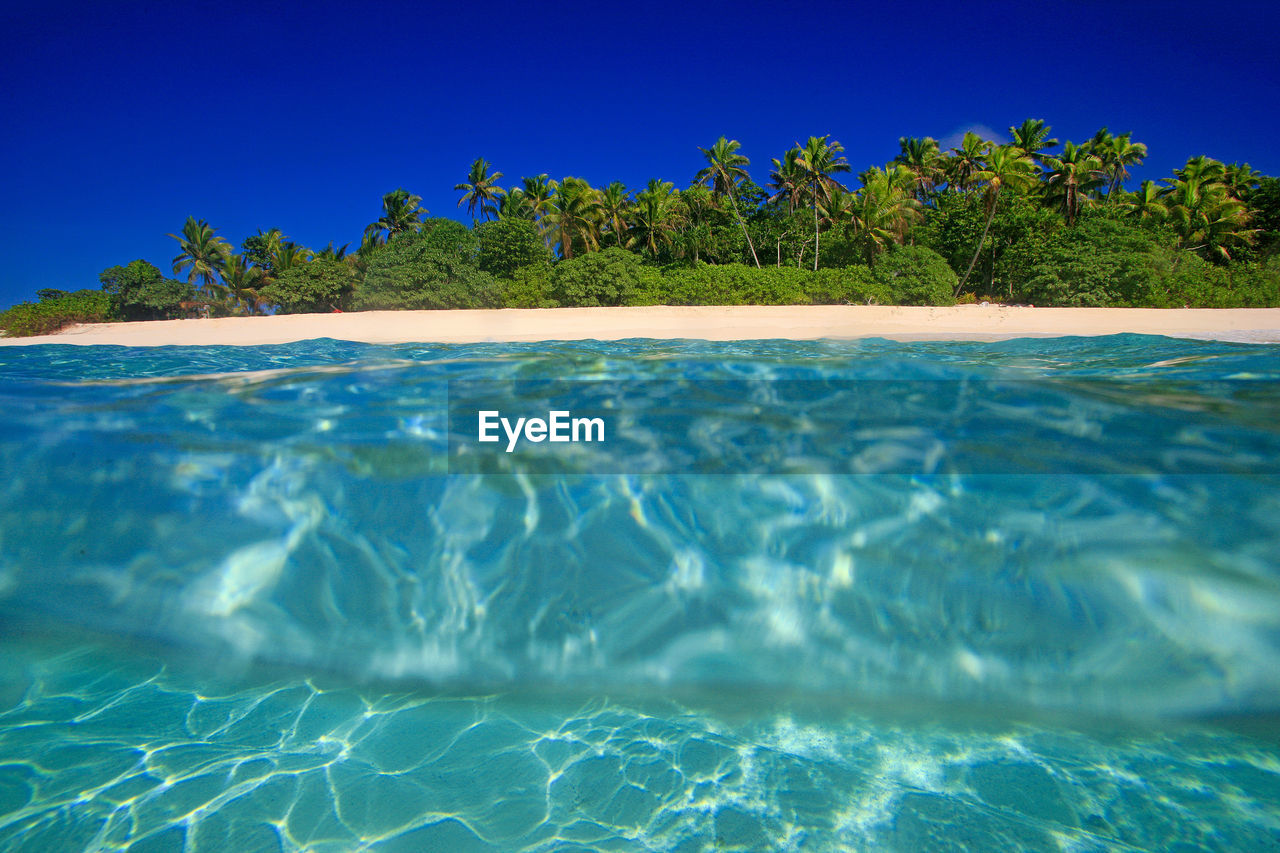 SCENIC VIEW OF SWIMMING POOL AGAINST SKY