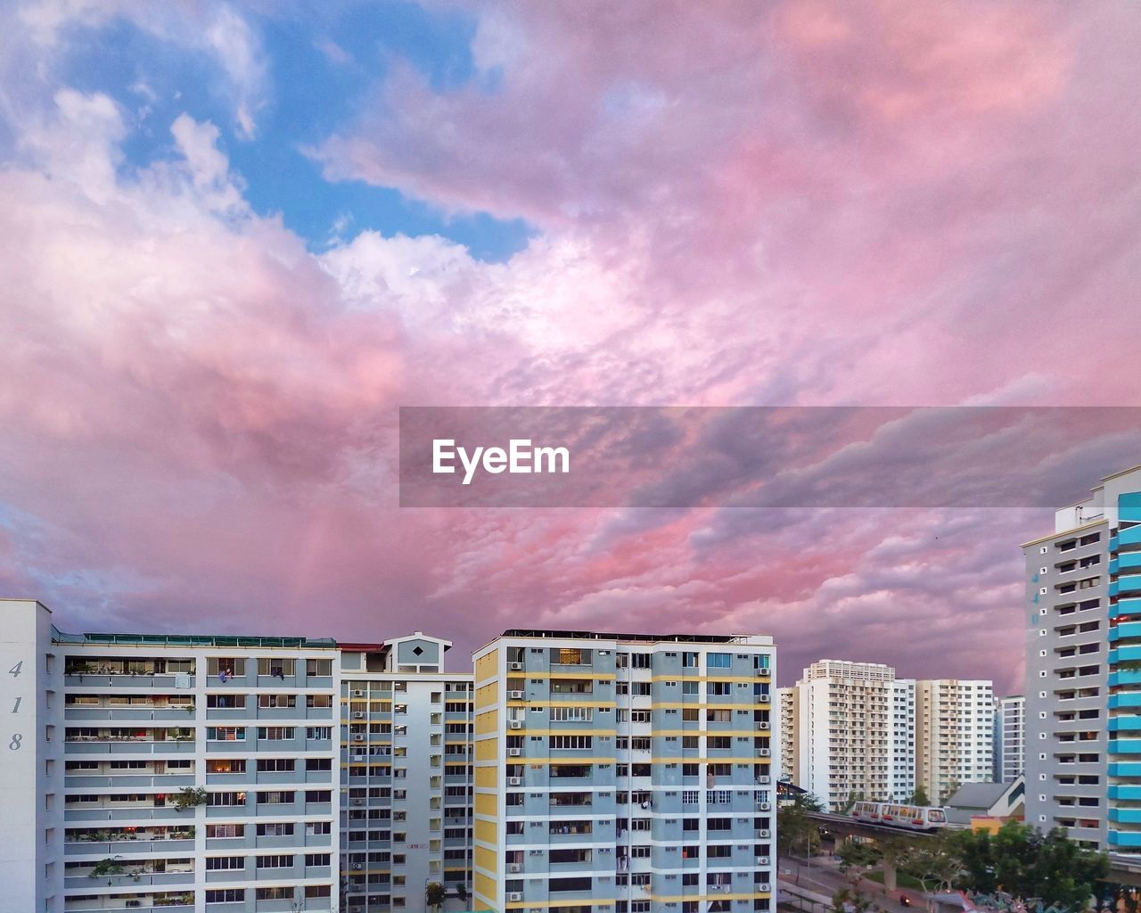 architecture, building exterior, built structure, city, building, sky, tower block, cityscape, cloud, skyscraper, skyline, residential area, horizon, office building exterior, residential district, nature, urban area, landscape, apartment, metropolitan area, condominium, construction industry, no people, business finance and industry, outdoors, urban skyline, shield, downtown, development, office, sunset, shielding, industry, city life, home ownership, environment, metropolis, downtown district, dramatic sky