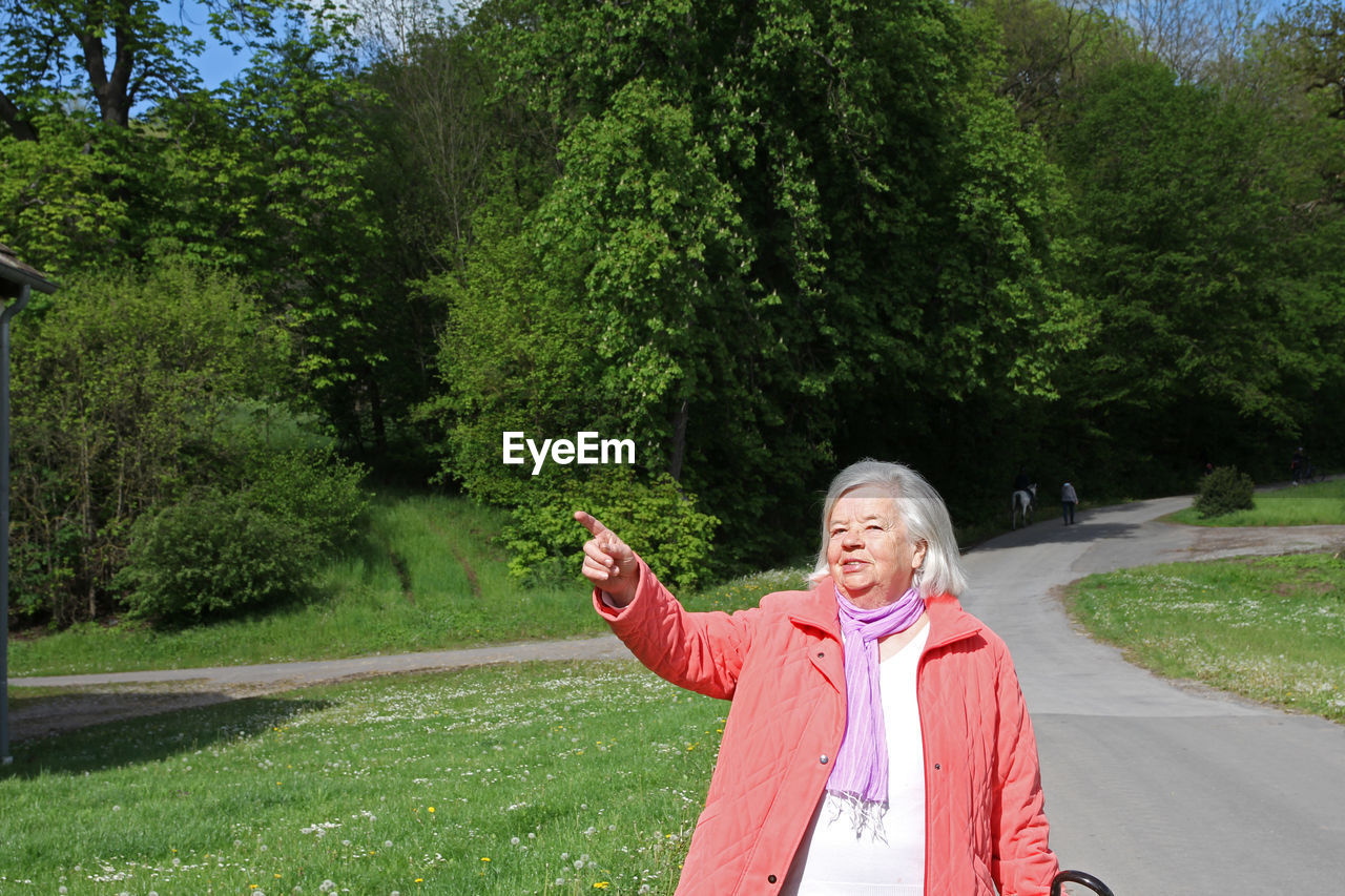 Woman in park, life is full of new things, there is something to see again