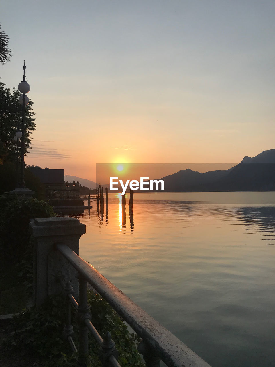 VIEW OF SWIMMING POOL AT SUNSET