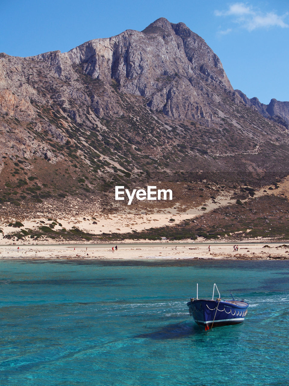 View of balos bay with a fishing boat, crete, greece
