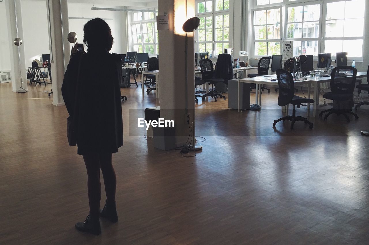 Woman standing in office