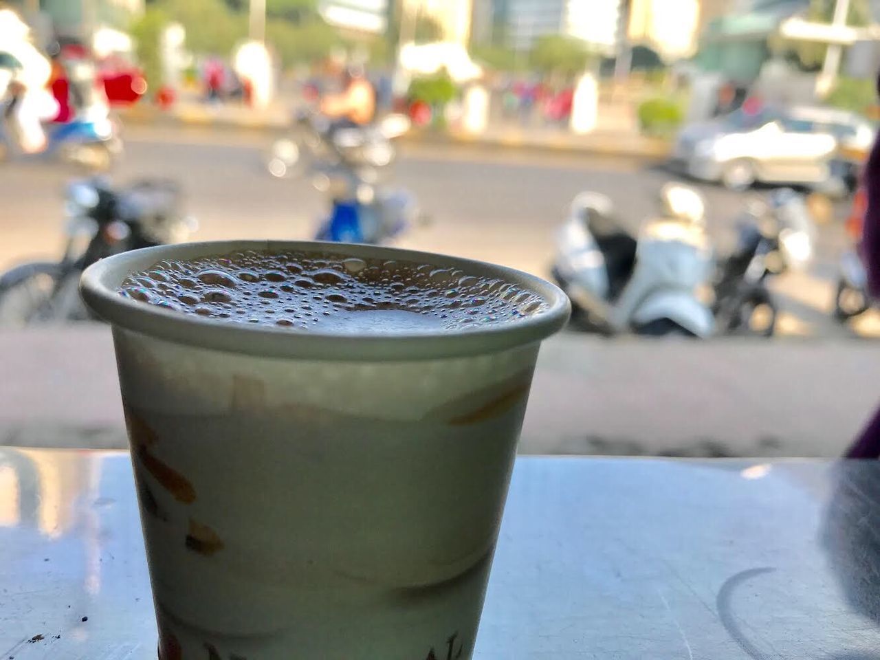 CLOSE-UP OF COFFEE SERVED ON TABLE