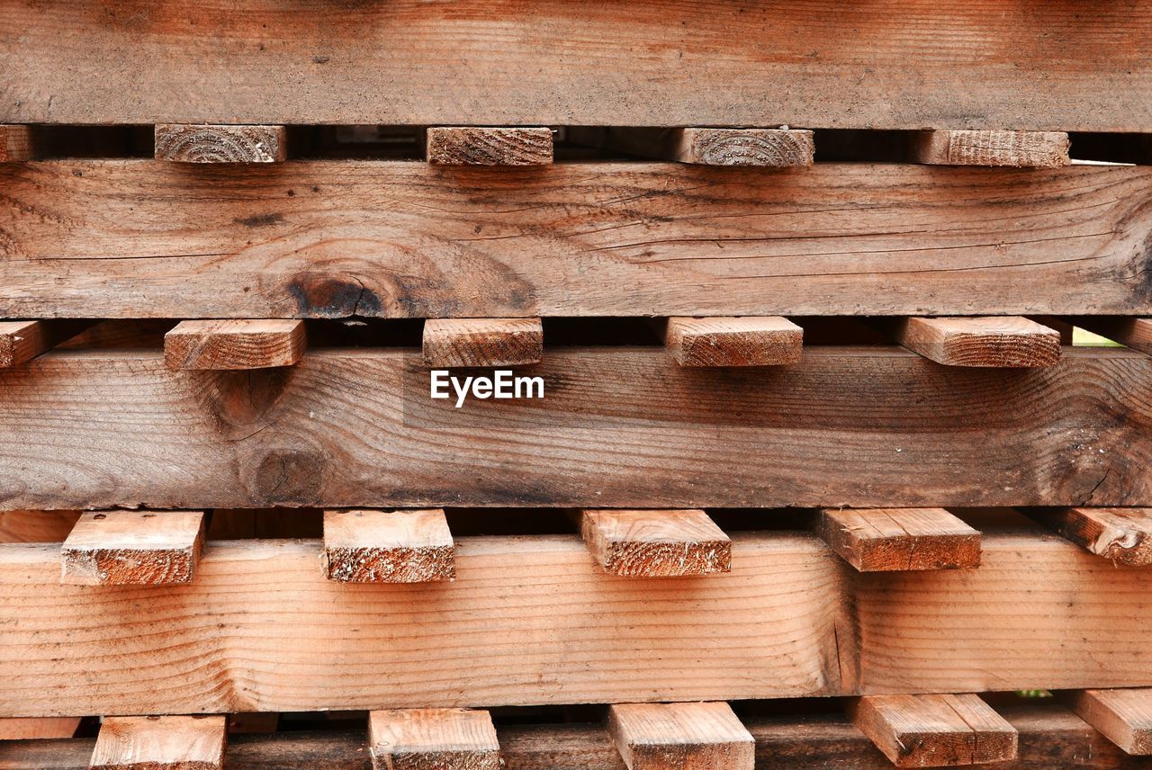 STACK OF WOODEN LOGS