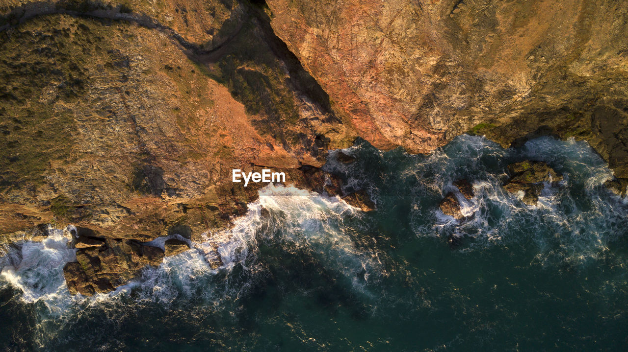 Aerial view of rock formation in water