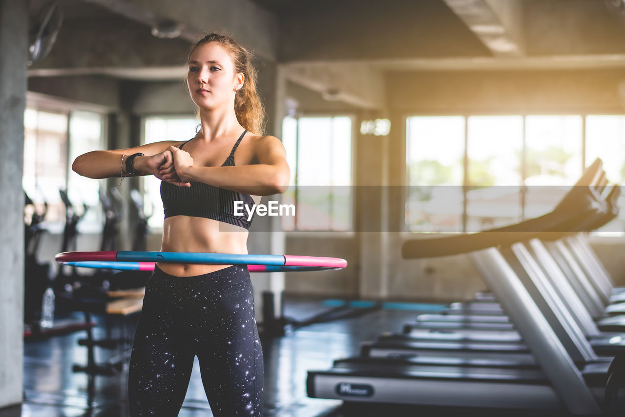 Woman exercising in gym