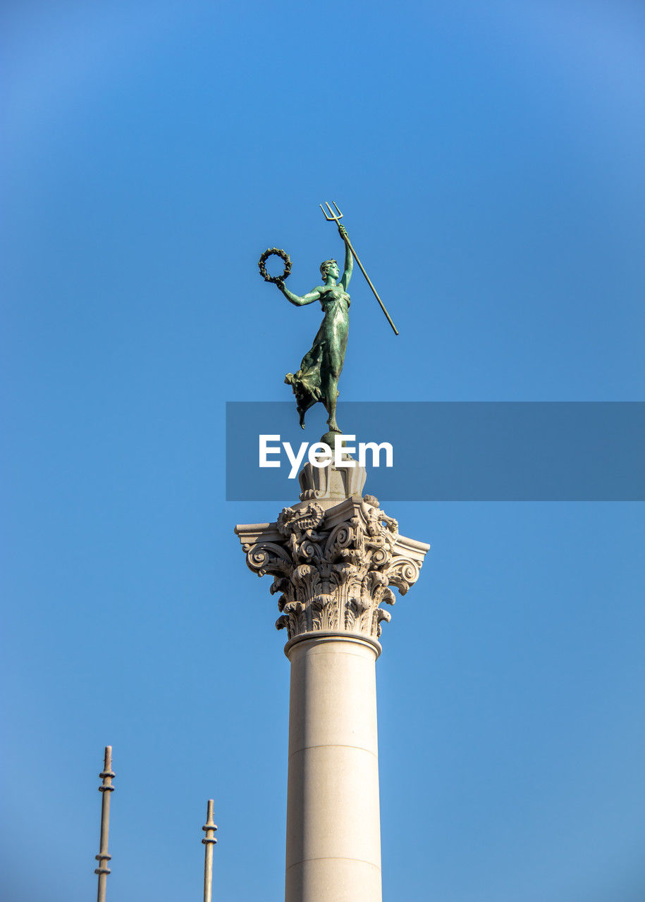 low angle view of statue against clear sky