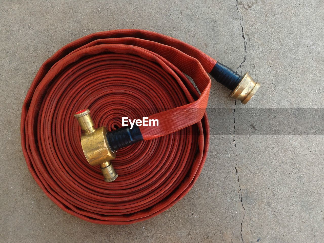 High angle view of fire hose on floor