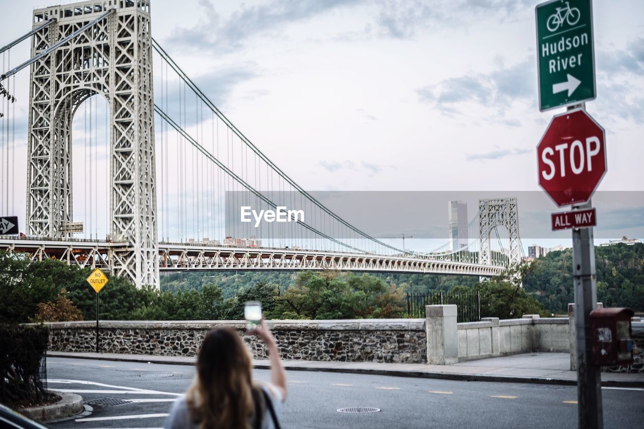 Suspension bridge with sky in background