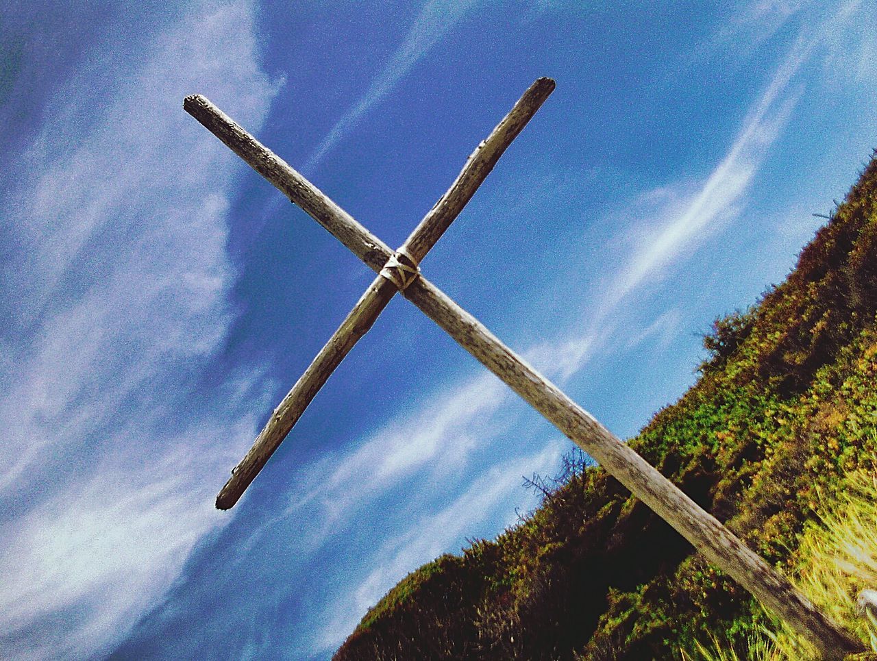 LOW ANGLE VIEW OF WINDMILL AGAINST BLUE SKY