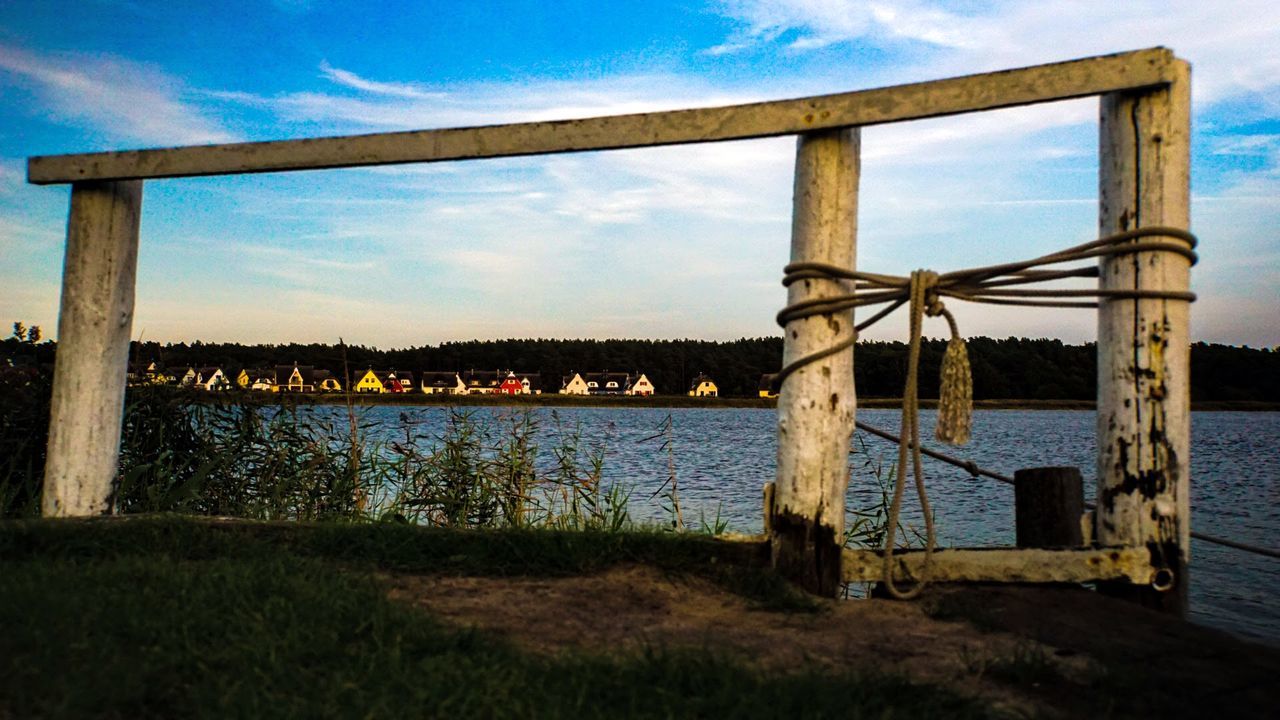 sky, water, nature, cloud, architecture, built structure, sea, no people, land, beach, outdoors, bridge, tranquility, scenics - nature, day, blue, plant, beauty in nature, reflection, horizon, tranquil scene, grass, wood, landscape, sunset