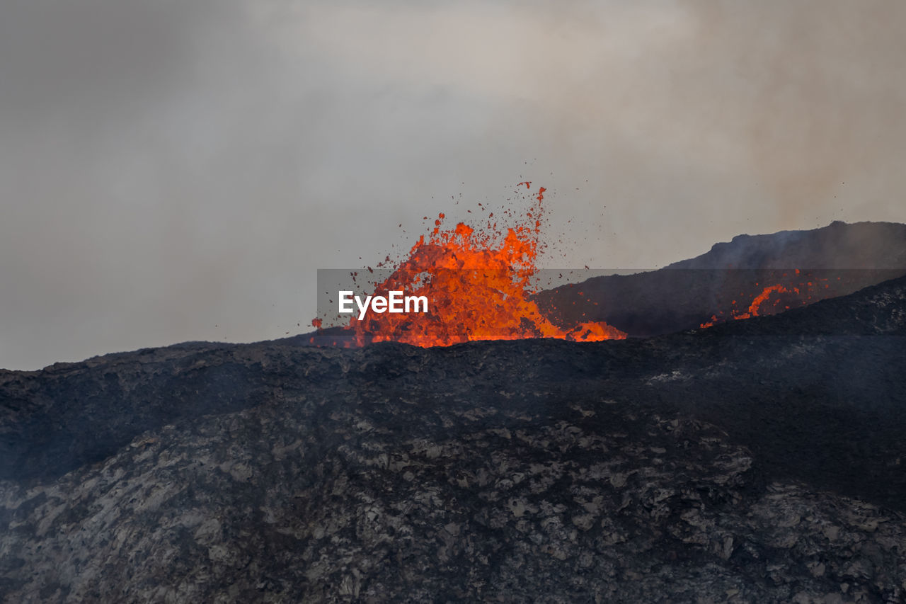 View of lava coming out of volcano
