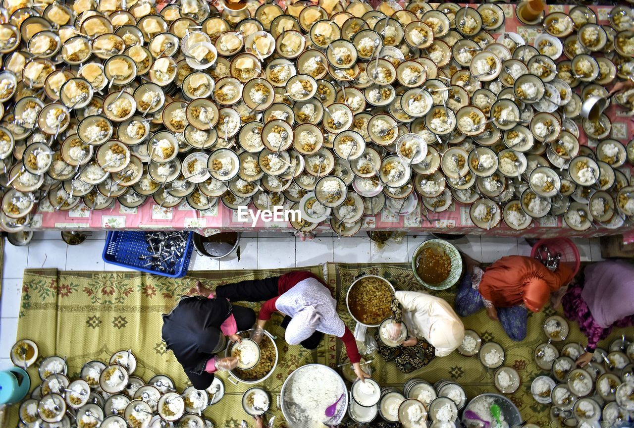 Directly above shot of people serving food