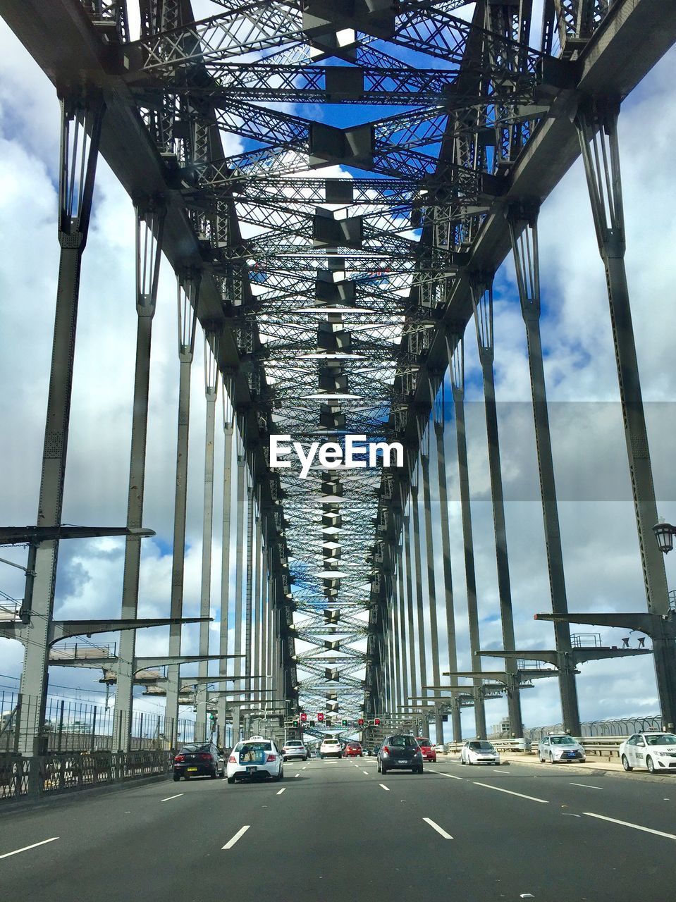 View of bridge against sky in city