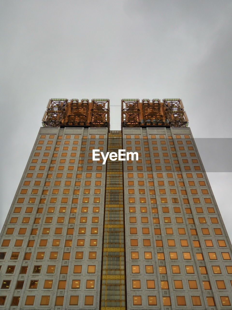 Low angle view of skyscraper against sky