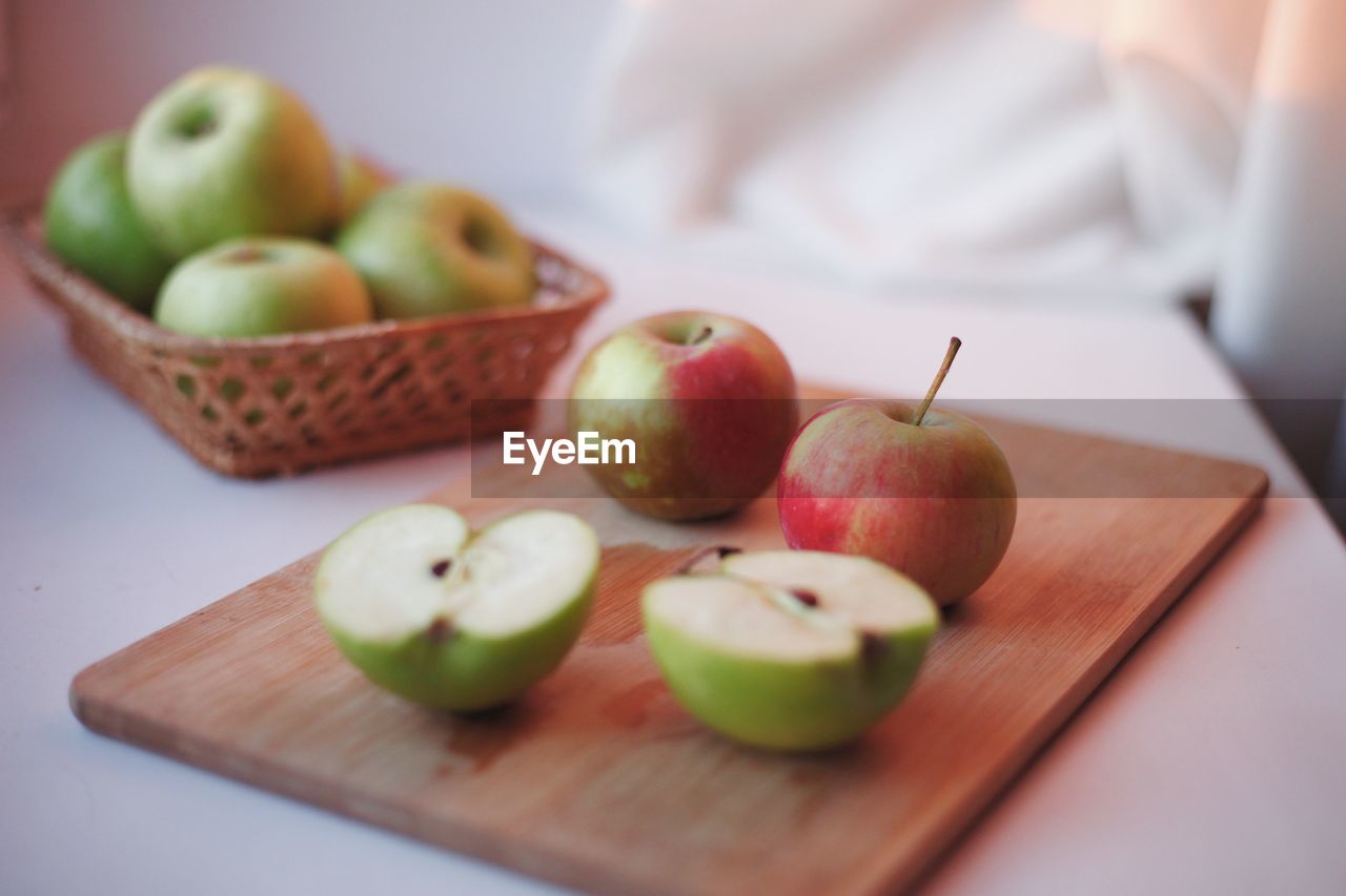 close-up of granny smith apples on table