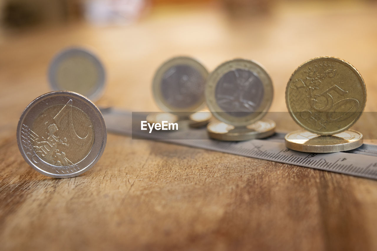 finance, coin, money, business, currency, wealth, close-up, finance and economy, cash, savings, money handling, business finance and industry, investment, no people, metal, selective focus, economy, indoors, table, still life, banking