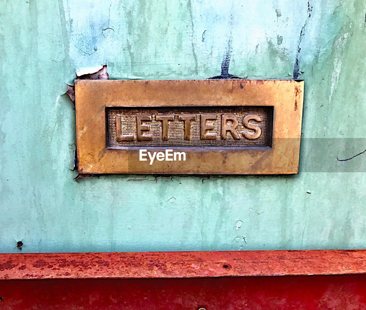 Close-up of mailbox on wall