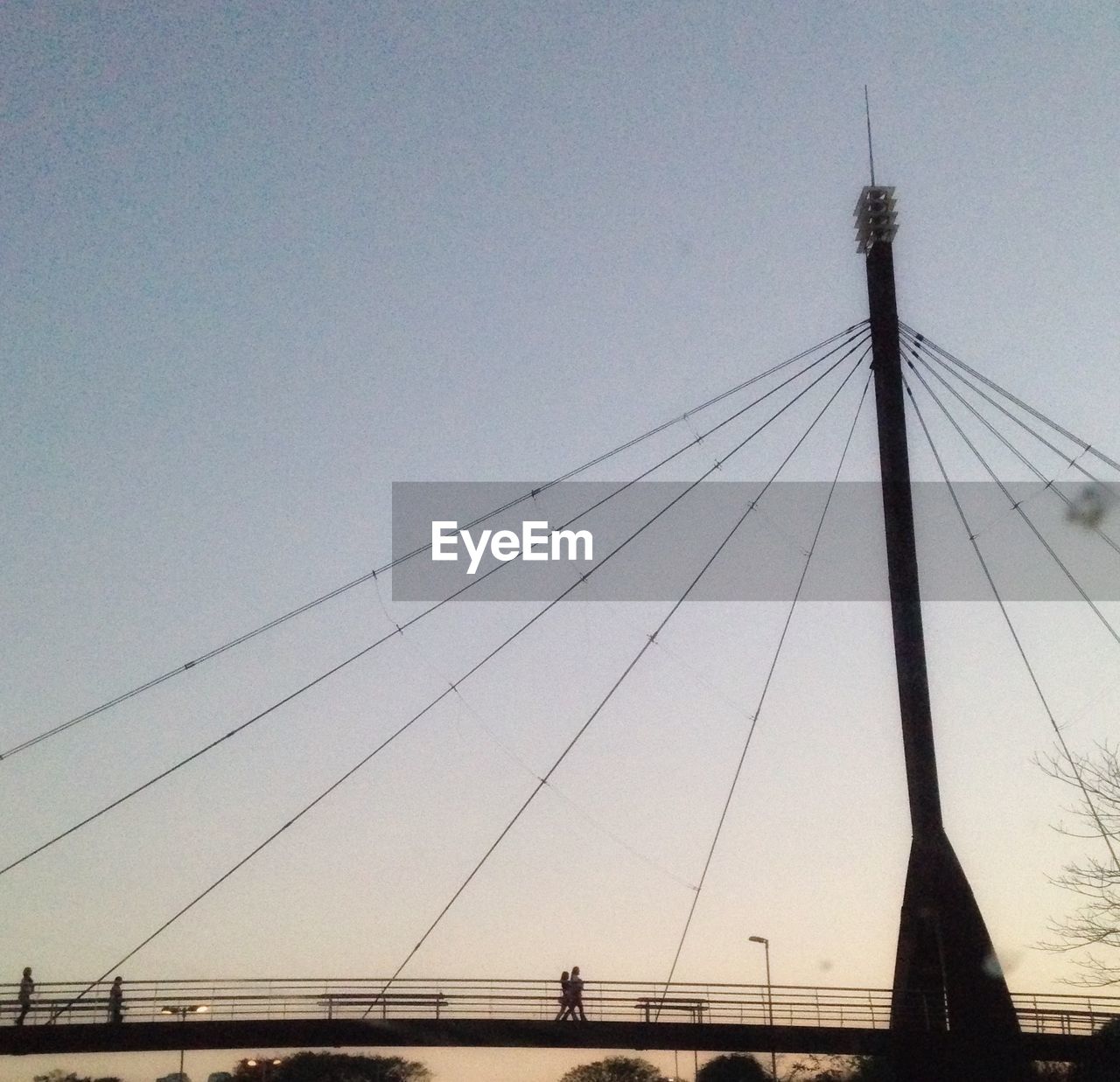 LOW ANGLE VIEW OF SUSPENSION BRIDGE AGAINST SKY