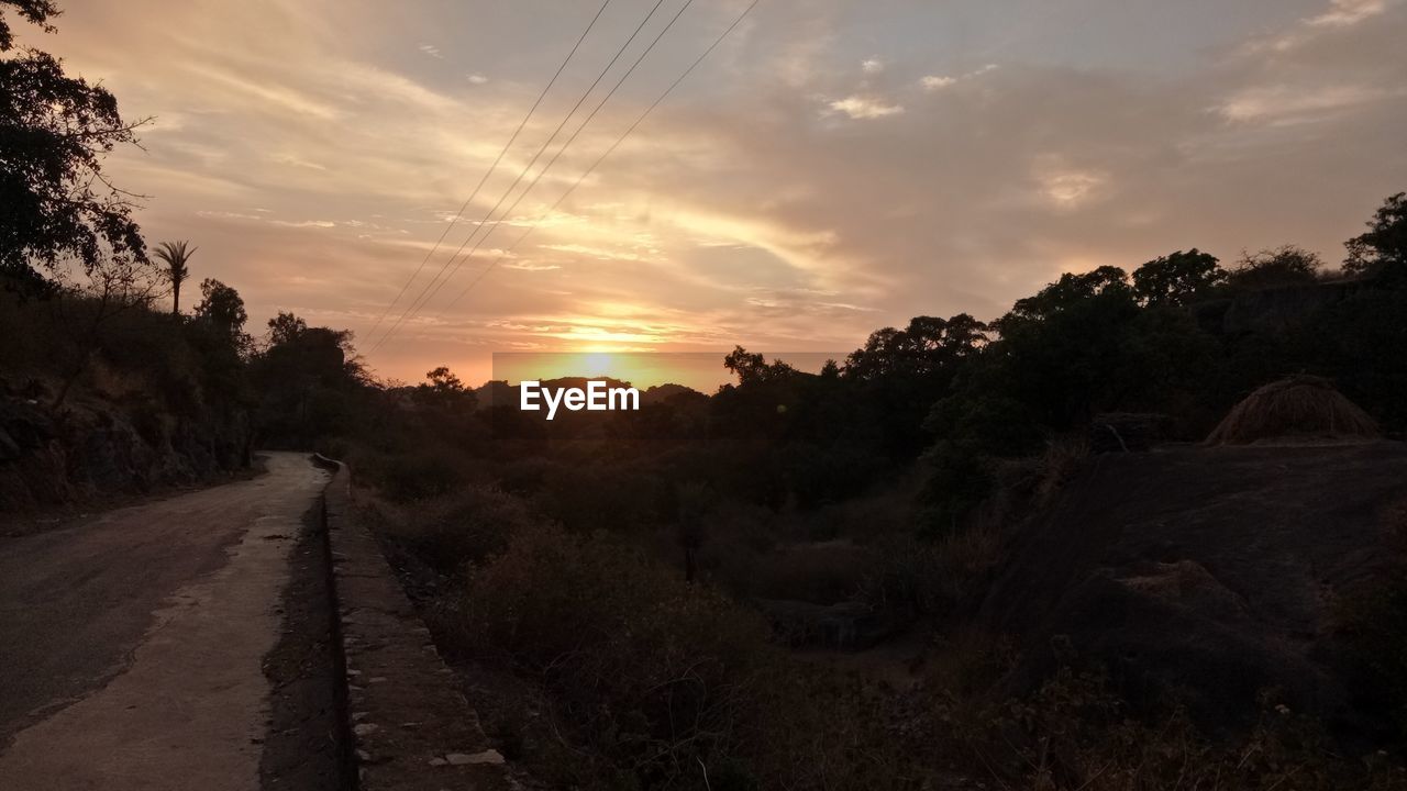 Scenic view of landscape against sky during sunset