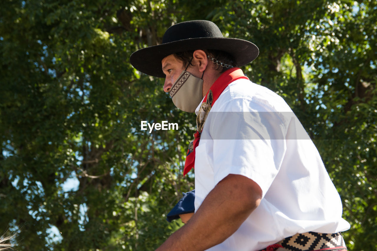 Portrait of argentinian gaucho wearing face mask