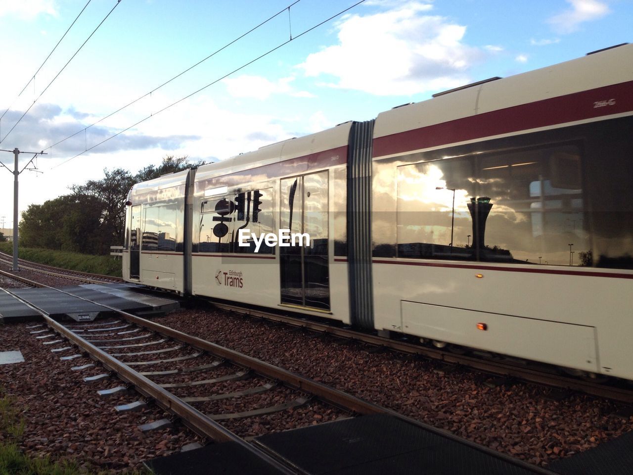 TRAIN ON RAILROAD TRACKS