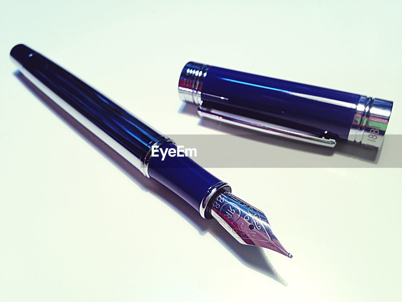 Fountain pen against white background