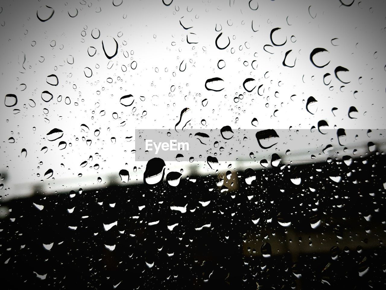 WATER DROPS ON GLASS