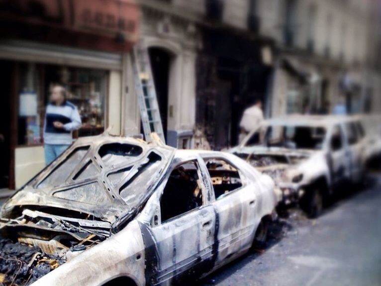 Damaged cars on street