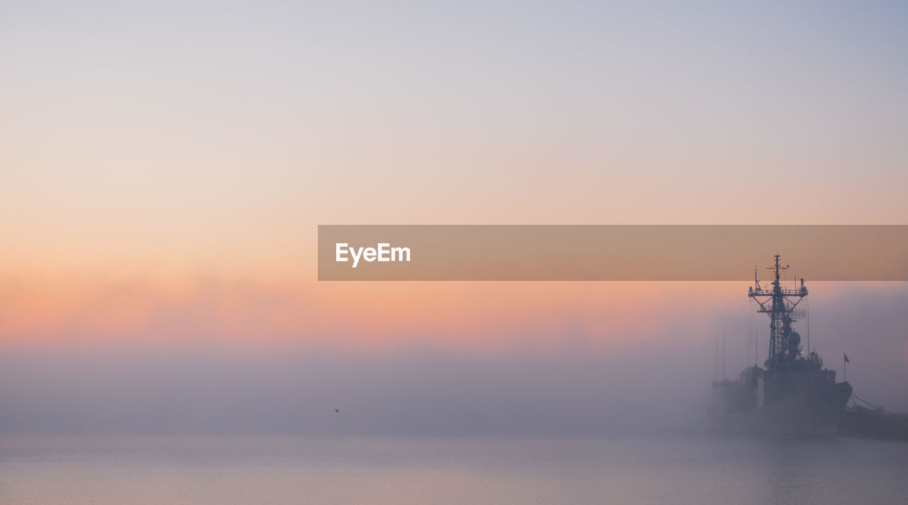 Scenic view of seascape against sky during sunset