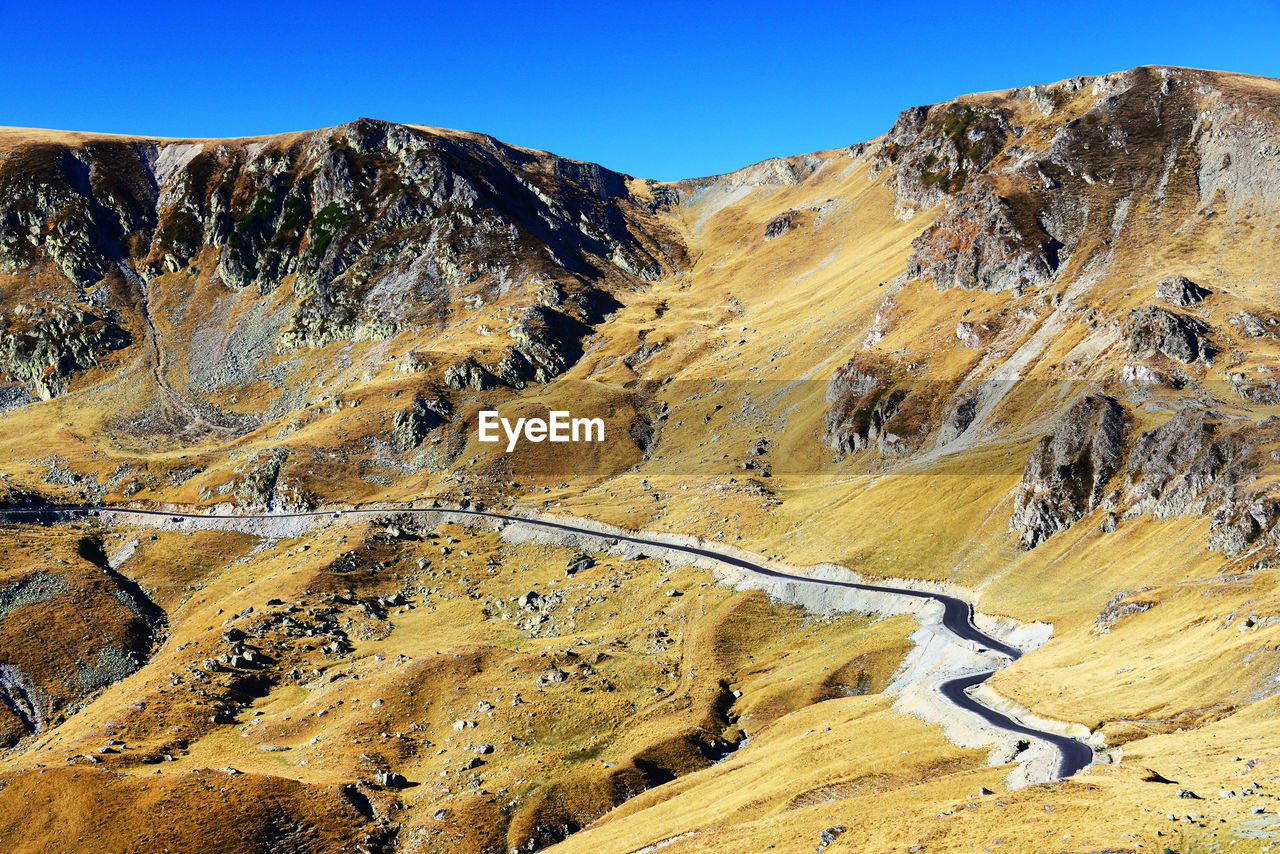 Scenic view of mountains against clear sky