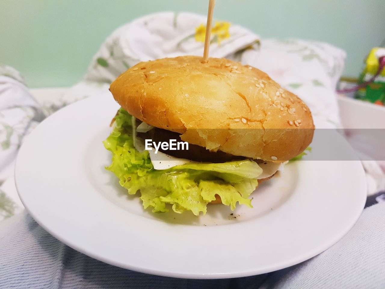 Close-up of burger in plate on table