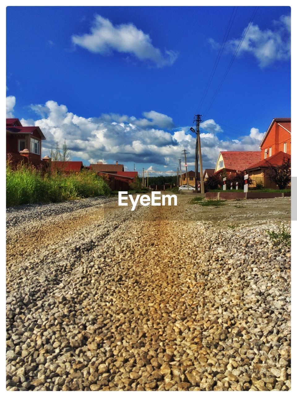 Pebbles on street against sky